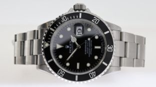 ROLEX OYSTER PERPETUAL SUBMARINER REFERENCE 16610 CIRCA 2007 WITH BOX AND PAPERS, black dial with
