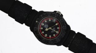 VINTAGE TAG HEUER FORMULA 1 PROFESSIONAL 'NIGHT RIDER' , luminous hour markers, black dial with