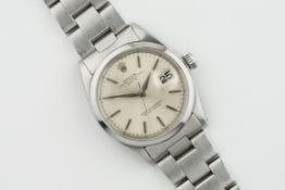 ROLEX OYSTER PERPETUAL DATE 'SWISS ONLY' DIAL REF. 1500, circular silver dial with hour markers