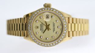 LADIES 18CT ROLEX DATEJUST REFERENCE 69178 CIRCA 1989, circular champagne dial with diamond dot hour