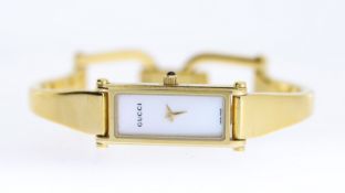 GUCCI 1500L BANGLE WATCH, mother of pearl dial, gold plated case, quartz