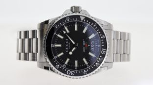 GUCCI DIVE REFERENCE 136.3, black dial, luminous hour markers, rotating outer bezel, 43mm case (