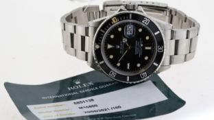 ROLEX OYSTER PERPETUAL SUBMARINER REFERENCE 16800 CIRCA 186 WITH SERVICE CARD, black dial with