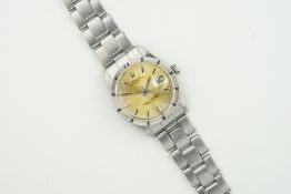 ROLEX OYSTER PERPETUAL DATE REF. 1501, circular patina dial with hour markers and hands, 34mm
