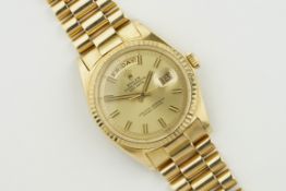 ROLEX OYSTER PERPETUAL DAY-DATE 18CT GOLD 'WIDE BOY' REF. 1803 CIRCA 1970, circular champagne wide