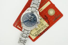 OMEGA SPEEDMASTER TRIPLE CALENDAR W/ GUARANTEE CARD, circular blue dial with hour markers and hands,