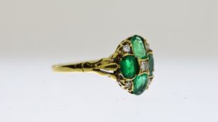 Antique Emerald andRose cut diamond ring, four Emeralds as and oval, spaced with Rose cut