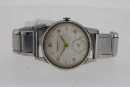 VINTAGE MOVADO MANUAL WIND, cream dial with Arabic and arrow hour markers, 32mm steel case, inner