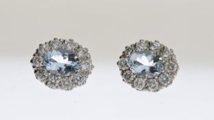 18WG Claw set oval aqua and diamond cluster earrings A2.50 D1.90