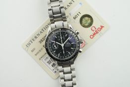 OMEGA SPEEDMASTER MK40 TRIPLE CALENDAR W/ GUARANTEE CARDS, circular black dial with hour markers and
