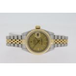 LADIES ROLEX DATEJUST REFERENCE 69173 CIRCA 1993, circular champagne dial with baton hour markers,