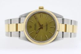 ROLEX OYSTER PERPETUAL REFERENCE 14233 CIRCA 1994, circular champagne dial with baton hour