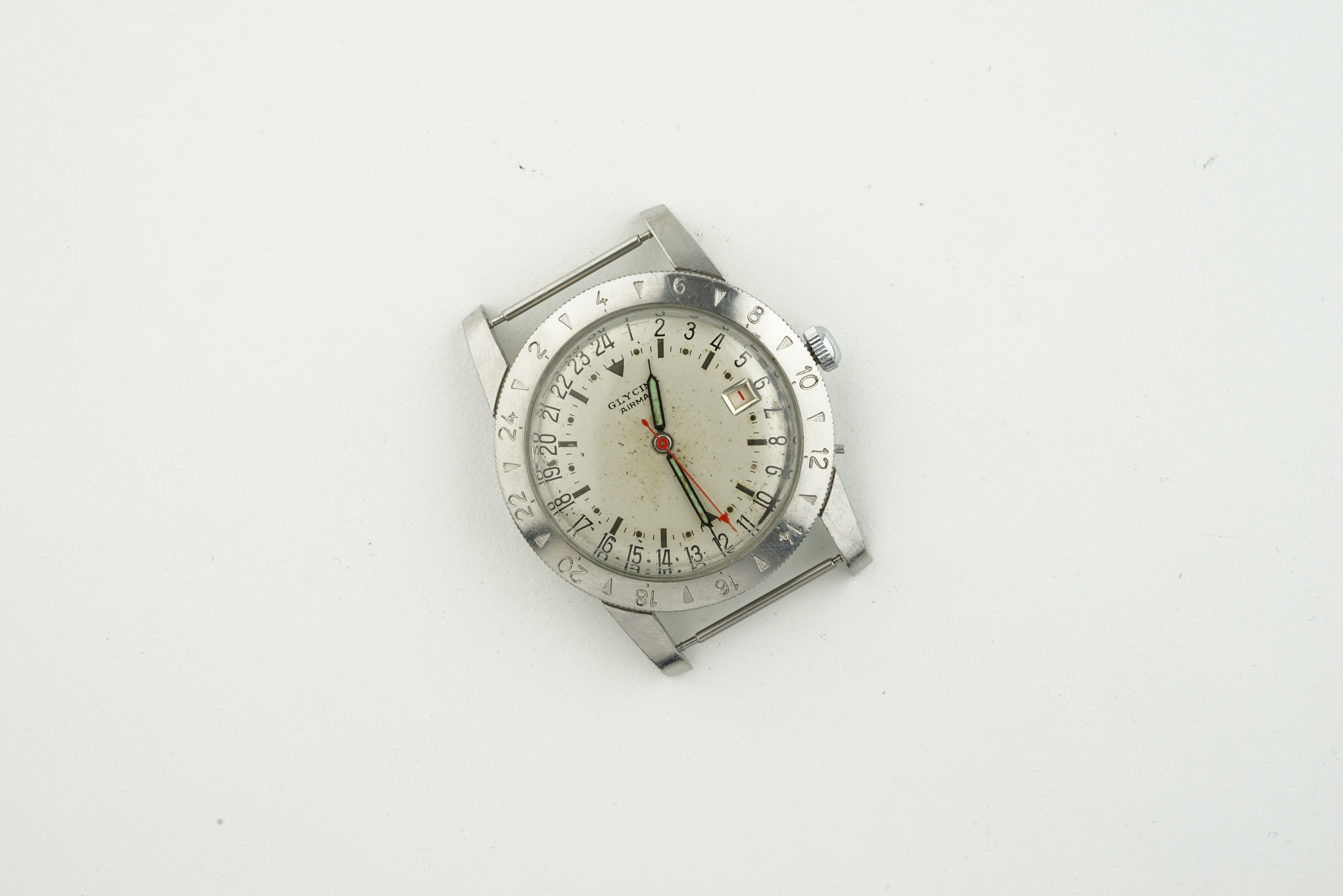 GLYCINE AIRMAN, circular off white dial with hour markers and hands, 35mm stainless steel case