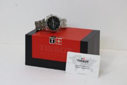 TISSOT CHRONOGRAPH AUTOMATIC REFERENCE T035627A CIRCA 2013 WITH BOX AND PAPERS, black dial, triple