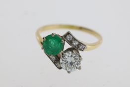 Vintage emerald and diamond cross over ring inwhite and yellow metal (no marks present)