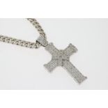 Fine 14ct White Gold Diamond Set Cross Hanging on a Silver curb chain. The cross measures 8cm x 4.