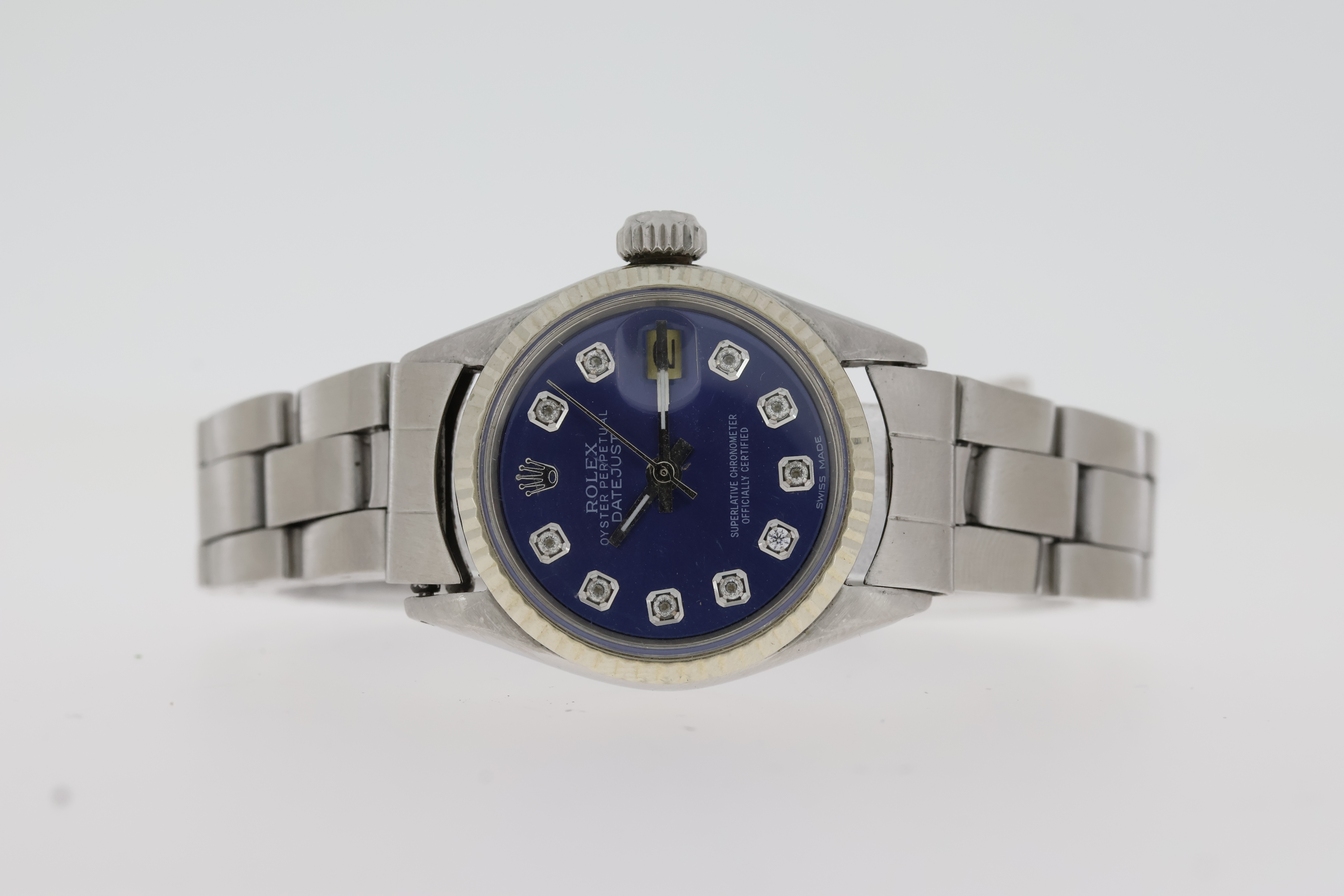 LADIES ROLEX DATEJUST 26 REFERENCE 6517 CIRCA 1969, circular aftermarket blue dial with diamond hour