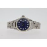 LADIES ROLEX DATEJUST 26 REFERENCE 6517 CIRCA 1969, circular aftermarket blue dial with diamond hour