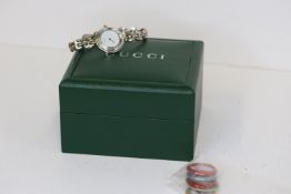 LADIES GUCCI QUARTZ WATCH REFERENCE 11/12.2 WITH BOX (PLUS 5 COLOURED BEZELS), 26mm stainless