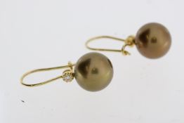 A pair of Tahitian chocolate Pearl and diamondearrings on shepherd hooks, marked 750 (18carat gold)
