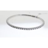 18ct 2.50ct Diamond Flexible Oval Bangle, approximately 56 diamonds mounted in 18ct white gold,