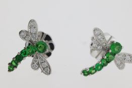 Pretty green garnet dragonfly earrings. Six graduated garnet gemstones make up the body, the wings