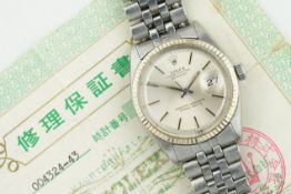 ROLEX OYSTER PERPETUAL DATEJUST WHITE GOLD BEZEL W/ GUARANTEE PAPERS REF. 1601, circular silver dial