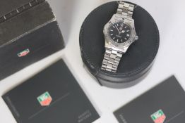 TAG HEUER 2000 CLASSIC, QUARTZ WATCH REFERENCE WK1110-0 W/BOX AND PAPERS 2001. Approx 37mm stainless