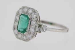 Platinum Emerald and diamond ring with small baguette shoulders Weights E0.95 D0.70
