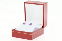Pair of 18ct white gold studs set with oval amethysts (0.80ct), boxed
