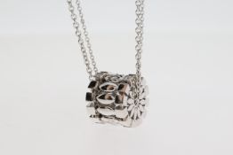 18 carat white gold Ferrari Firenze long double chain and wheel pendant which is diamond set Weights