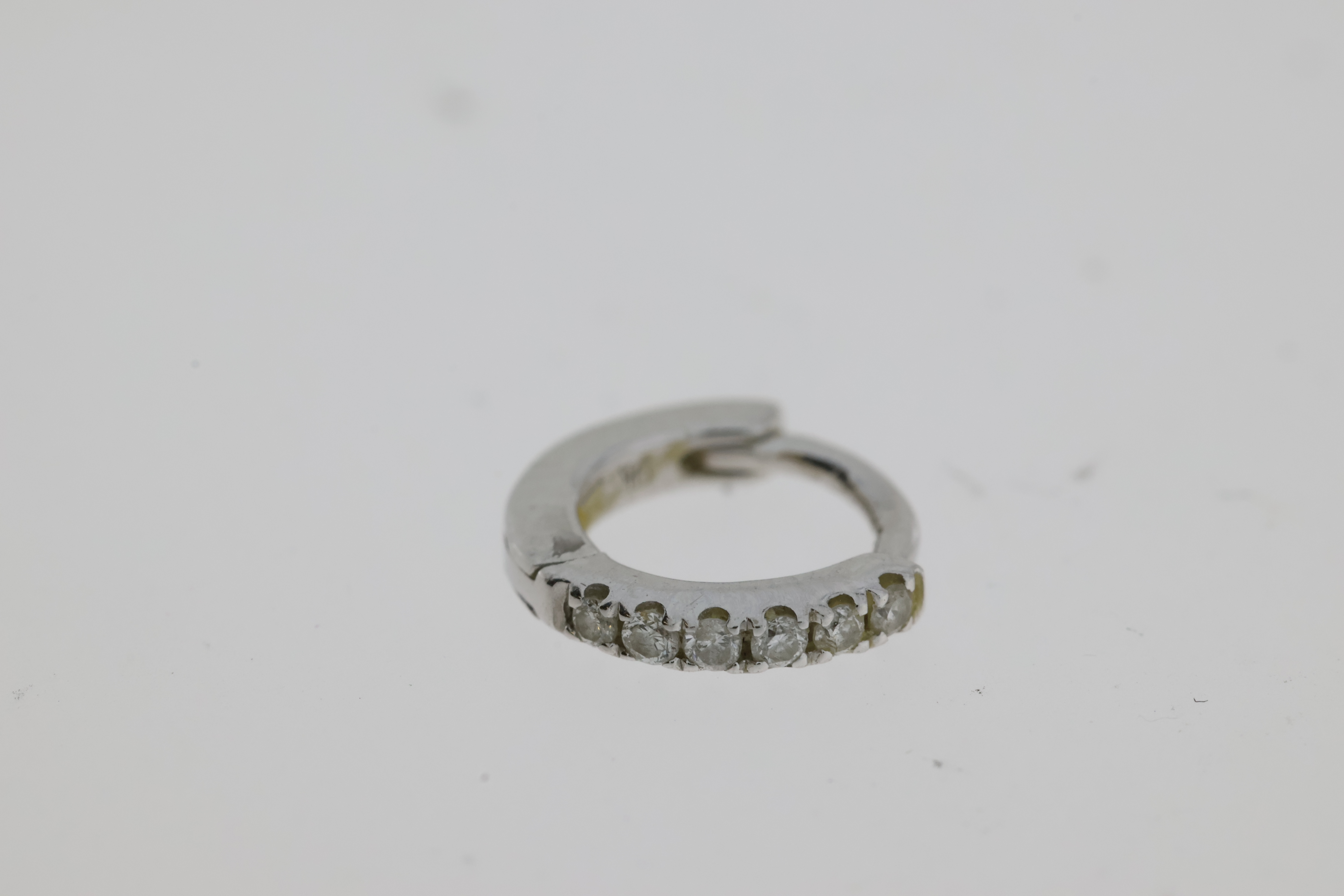 Hallmarked 375/9ct, diamond set