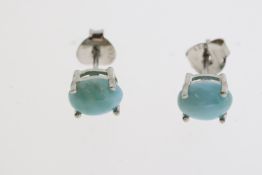 Pair of cabochon larimar studs in silver