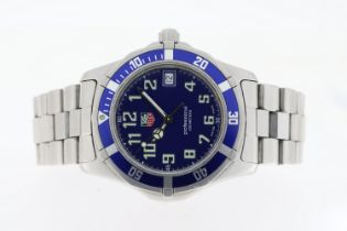 TAG HEUER PROFESSIONAL QUARTZ REFERENCE WM1113, circular blue dial with arabic numeral hour markers,