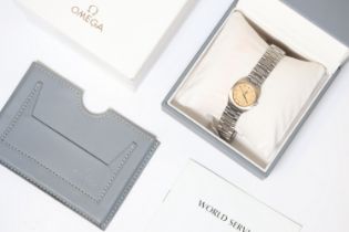 LADIES OMEGA SEAMASTER POLARIS QUARTZ WITH BOX AND BOOKLET, champagne dial, dot hour markers, 22mm