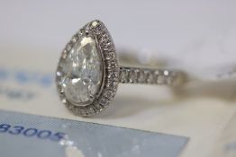 1.80ct Platinum pear cut diamond solitaire ring with diamond halo and shoulders. Centre stone weight