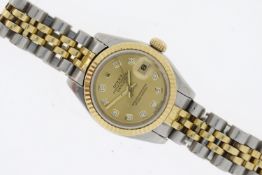 LADIES ROLEX DATEJUST DIAMOND DOT REFERENCE 179173, circular champagne dial with diamond dot hour