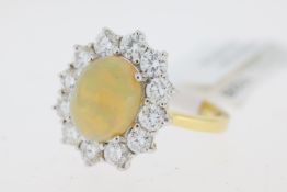 Opal and Diamond Cluster ring, 18ct yellow & white metal, Oval opal centre and round brilliant