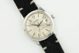 TUDOR OYSTERDATE SHIELD DIAL REF. 79920 CIRCA 1979, circular silver dial with hour markers and