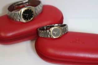 A PAIR OF OMEGA SEAMASTER POLARIS WRISTWATCHES