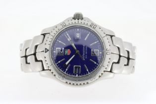 TAG HEUER PROFESSIONAL QUARTZ, circular blue dial with baton and arabic numeral hour markers,