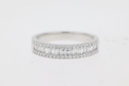 Platinum brilliant & baguette cut diamonds triple row claw set eternity ring. Approximate total
