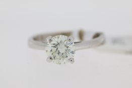 18ct white gold round brilliant diamond solitaire claw set ring. Approximate diamond carat weight