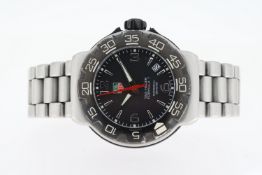 TAG HEUER PROFESSIONAL QUARTZ, circular black dial with baton and arabic numeral hour markers,