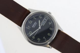 VINTAGE SEIKO ITALIAN MILITARY QUARTZ WATCH. This watch is on a genuine Hodinkee shell cordovan