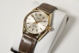 rolex oyster perpetual reference 1024 circa 1973, silver dial with baton hour markers, gold plated