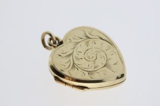 Hallmarked 375/9ct yellow gold opening heart locket with removable heart frames inside to allow
