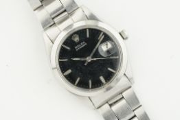 ROLEX OYSTERDATE SILVER GILT DIAL REF. 6694 CIRCA 1969, circular black dial with hour marker and