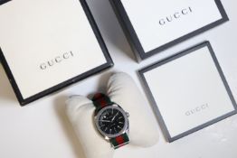 Gucci G-Timeless 142.3 Quick Set Date Quartz with Box