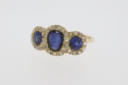 9ct Yellow Gold, 2.21ct Sapphire (x3 - 2x Round Sides, 1x Uneven Oval Centre), 0.99pt Diamond